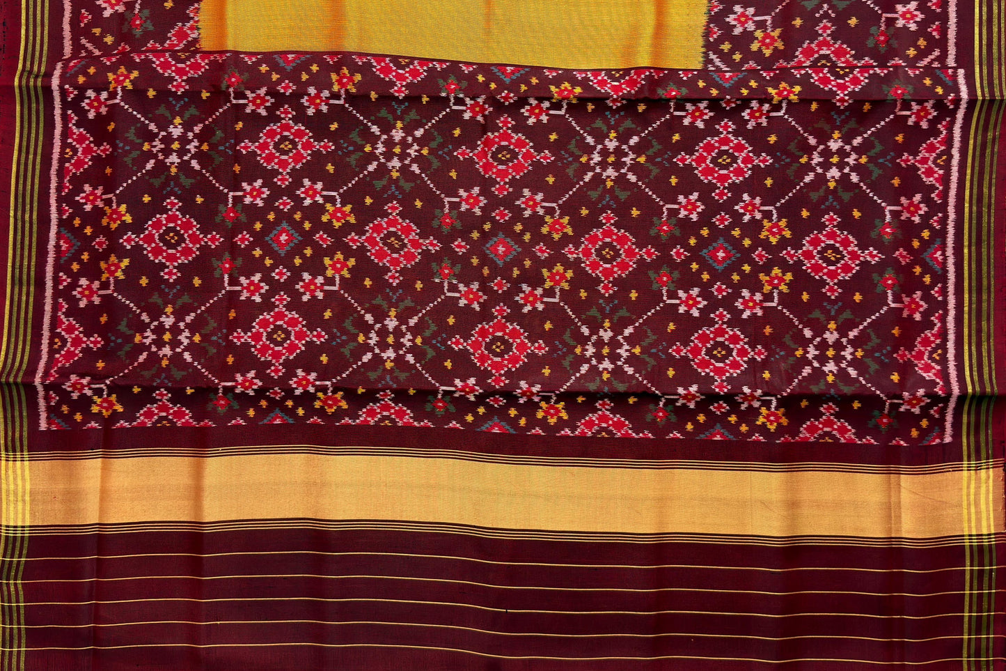 Maroon & Mustard Ratan Chokdi Patola Saree